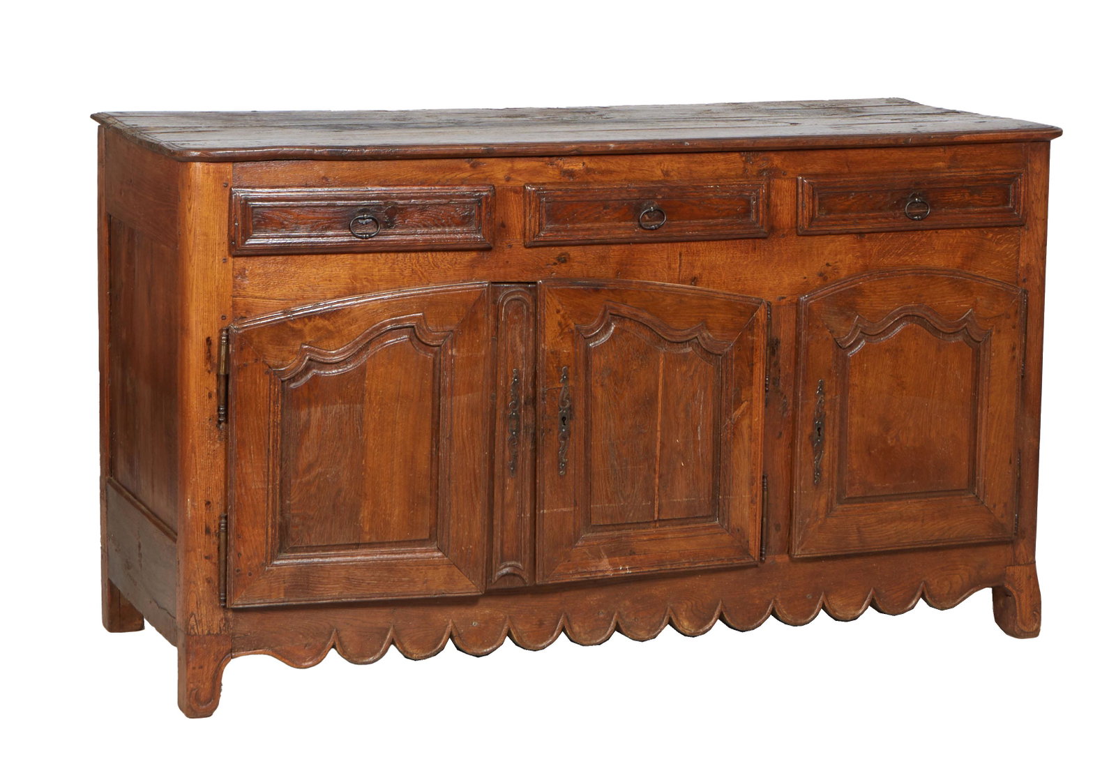 French Provincial Carved Oak Louis XV Style Sideboard, 19th c., the stepped rounded corner three: French Provincial Carved Oak Louis XV Style Sideboard, 19th c., the stepped rounded corner three board top over three setback frieze drawers above three fielded panel cupboard doors with iron butt hin