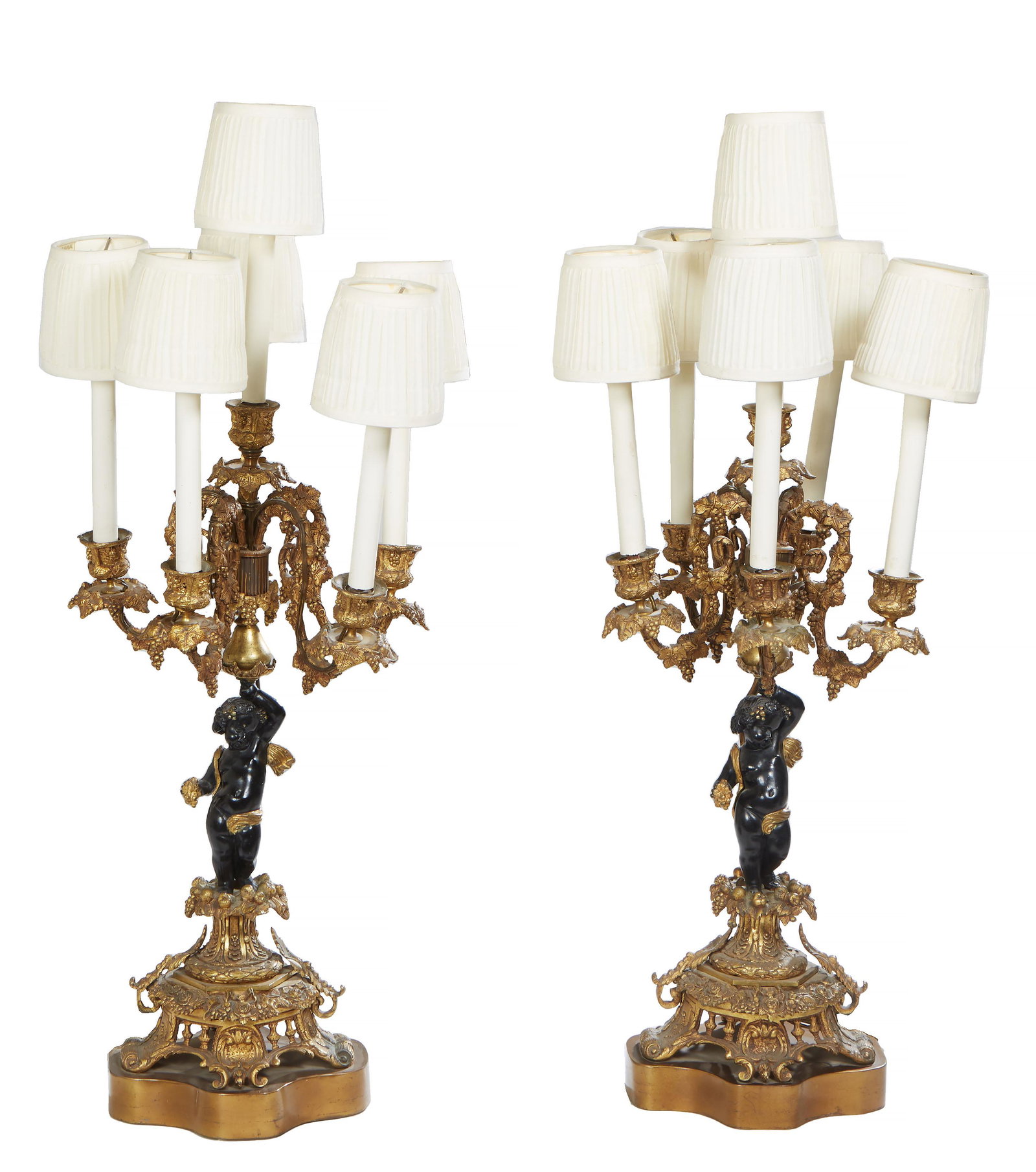 Pair of French Gilt and Patinated Bronze Putti Six Light Candelabra, 20th c., each with a patinated (1 of 1)