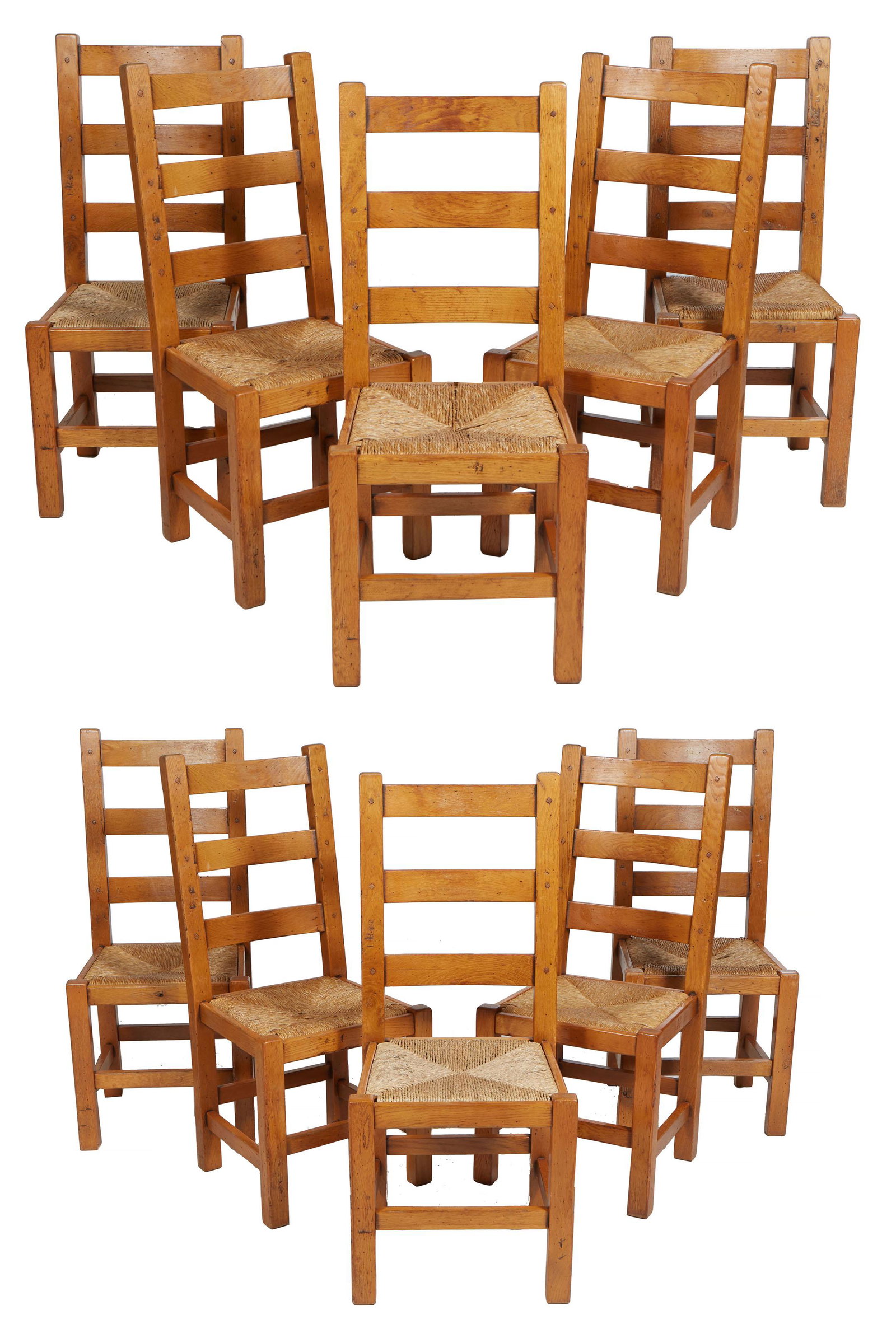 Set of Ten French Provincial Carved Oak Rushseat Dining Chairs, 20th c., the curved canted ladder (1 of 3)