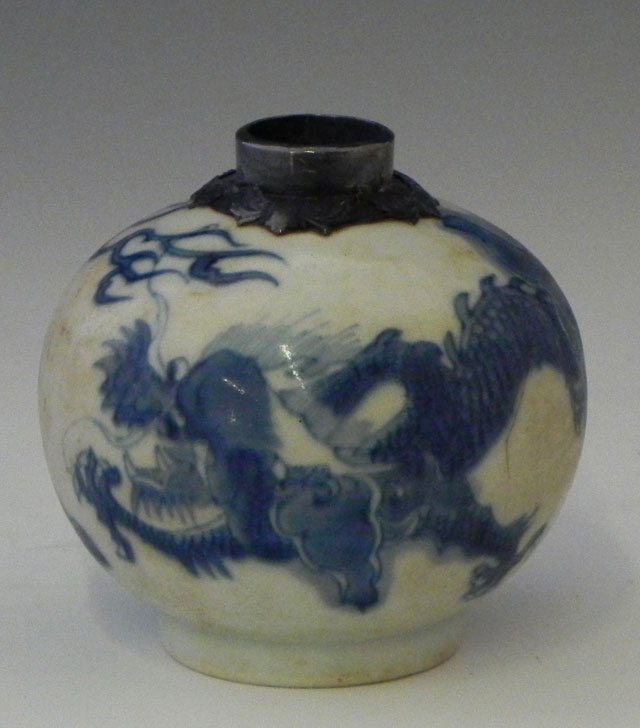 Oriental Blue and White Porcelain Ginger Jar, 19th: Oriental Blue and White Porcelain Ginger Jar, 19th c., with dragon decoration, and a silver relief decorate neck and rim, H.- 4 in., Dia.- 4 1/4 in.