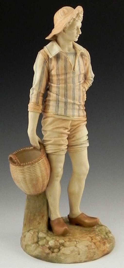 Royal Worcester Figure, c. 1900, #1202, of a fishe: Royal Worcester Figure, c. 1900, #1202, of a fisherman with a basket, with a Victorian registration number of 676080, verso impressed "Hadley," H.- 17 1/2 in., Dia.- 7 1/2 in.
