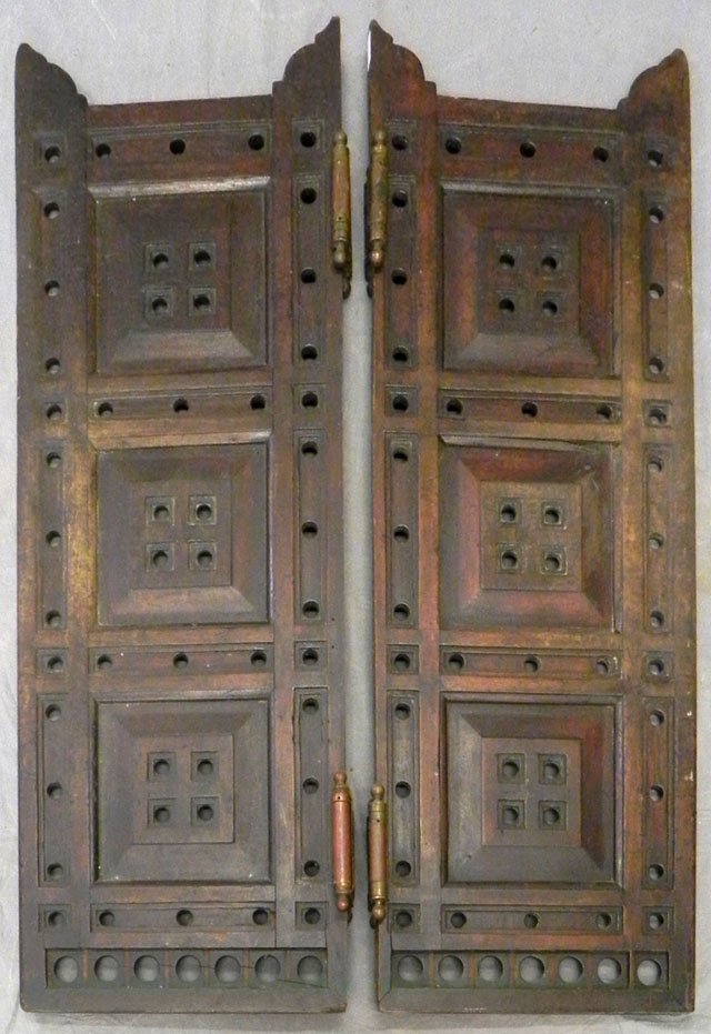 Pair of Carved Mahogany Swinging "Saloon" Doors, : Pair of Carved Mahogany Swinging "Saloon" Doors, 20th c., with hinges, H.- 47 1/2 in., W.- 16 1/2 in.