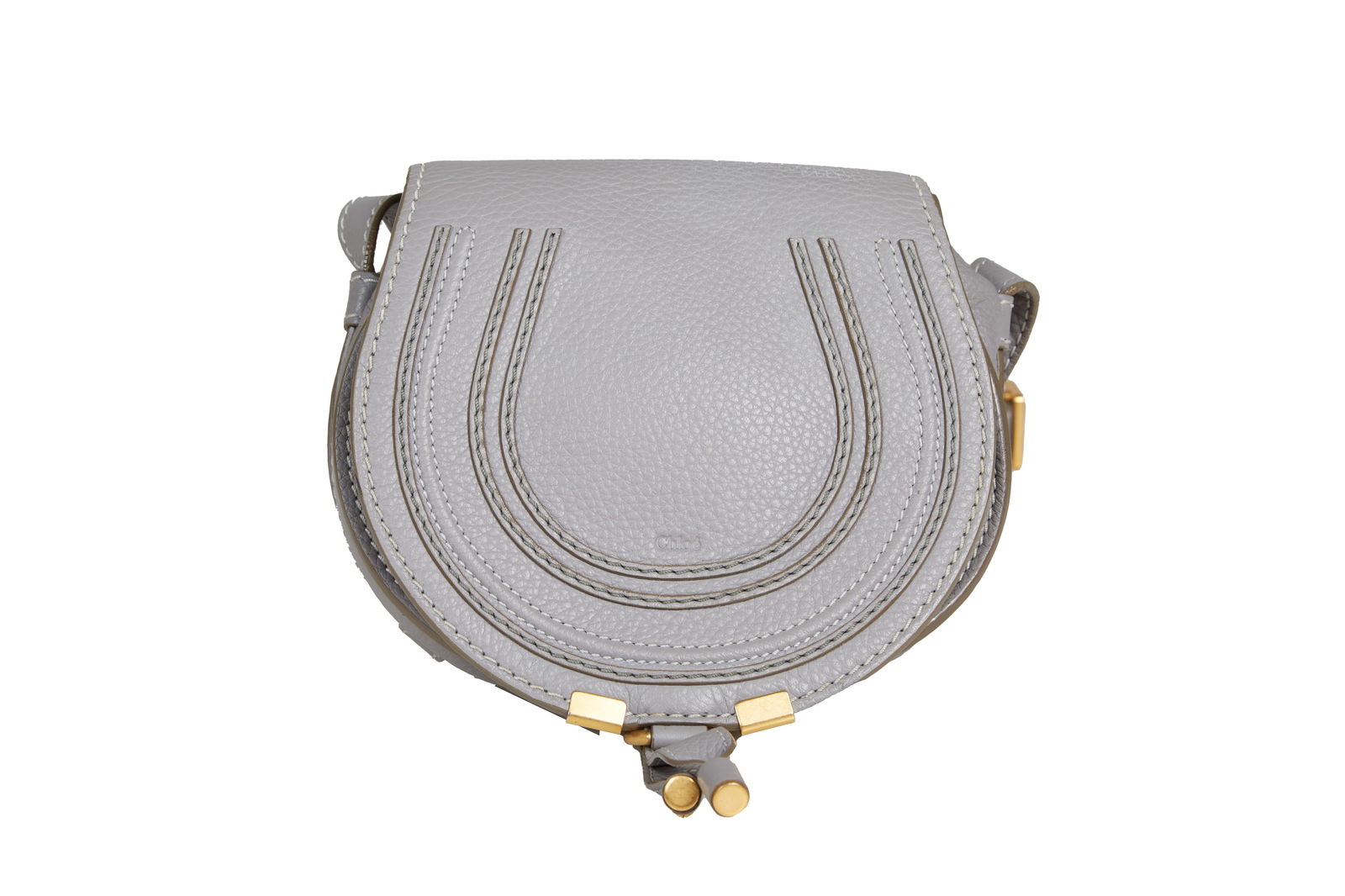 Chloe Marcie Small Saddle Bag: Chloe Marcie Small Saddle Bag, in grey leather, with a loop and tassel closure, opening to an olive green fabric lined interior with a front pocket and slip pocket, H.- 7 in., W.- 7 1/2 in.