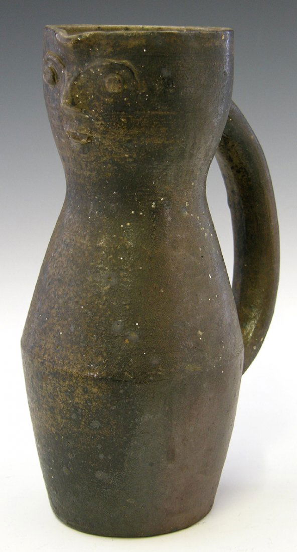 French Provincial Glazed Earthenware Face Jug, 20th: French Provincial Glazed Earthenware Face Jug, 20th c., signed J. Lerat, H.- 9 1/4 in., W.- 6 in., D.- 4 in.