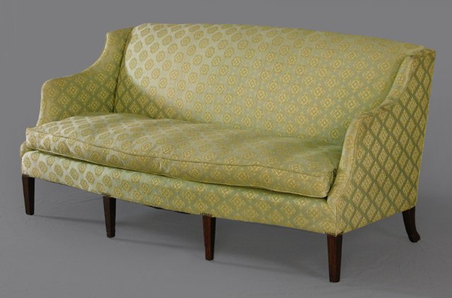 American Federal Style Upholstered Sofa, 19th c., t: American Federal Style Upholstered Sofa, 19th c., the arched back to upholstered arms and a removable down cushion, with brass tack upholstery, on tapering square mahogany legs, H.- 34 in., W.- 69 1/4