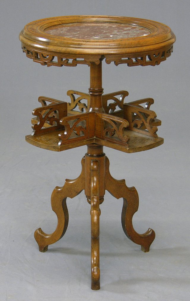 Unusual Carved Beech Marble Top Smoker's Table, 19: Unusual Carved Beech Marble Top Smoker's Table, 19th c., the circular highly figured marble within a border with incised leaf carving, on a turned support over a rotating compartmented central shelf w