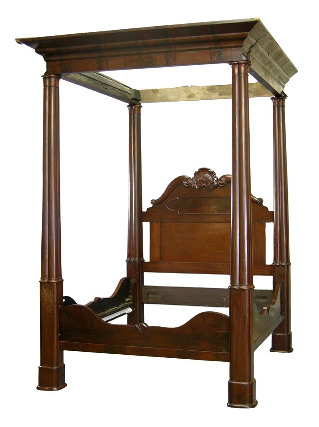 Southern Carved Mahogany Tester Bed, c. 1850, the: Southern Carved Mahogany Tester Bed, c. 1850, the ogee full tester on cluster columns, with an arched headboard with a central carved shell, flanked by roundel mounted volutes, the scalloped rails and