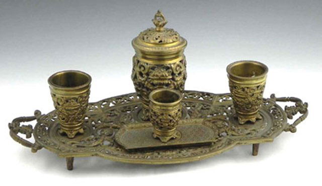 Napoleon III Pierced Bronze Desk Set, 19th c., the: Napoleon III Pierced Bronze Desk Set, 19th c., the oval handled tray fitted for a smaller tray, three open cups and a large central covered bowl with pierced relief decorated sides, H.- 8 3/4 in., W.-