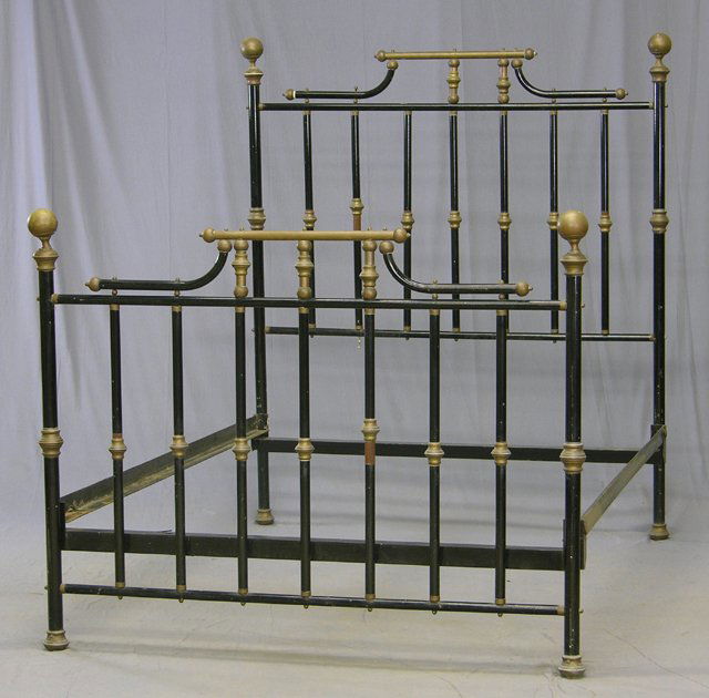 English Brass and Iron Double Bed, late 19th c.,: English Brass and Iron Double Bed, late 19th c., with a spindled headboard and footboard, with brass ball topped columns, H.- 65 in., Int. W.- 54 in., Int. D.- 76 in.