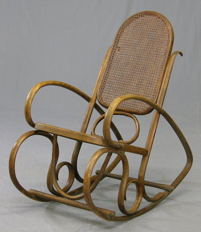 Bentwood Rocker, c. 1900, with a caned back and s: Bentwood Rocker, c. 1900, with a caned back and seat, H.- 40 1/2 in.