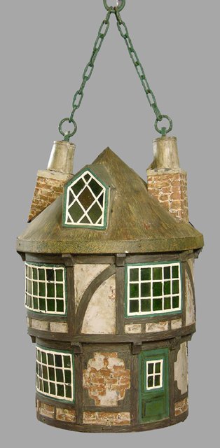 Unusual Metal Chandelier, 20th c., in the form of: Unusual Metal Chandelier, 20th c., in the form of a circular Tudor house, the inside marked "Made by F. C. Hancock, S.W. 8, London, the bottom with a pale green glass cover, H.- 40 in., Dia.- 25 in.