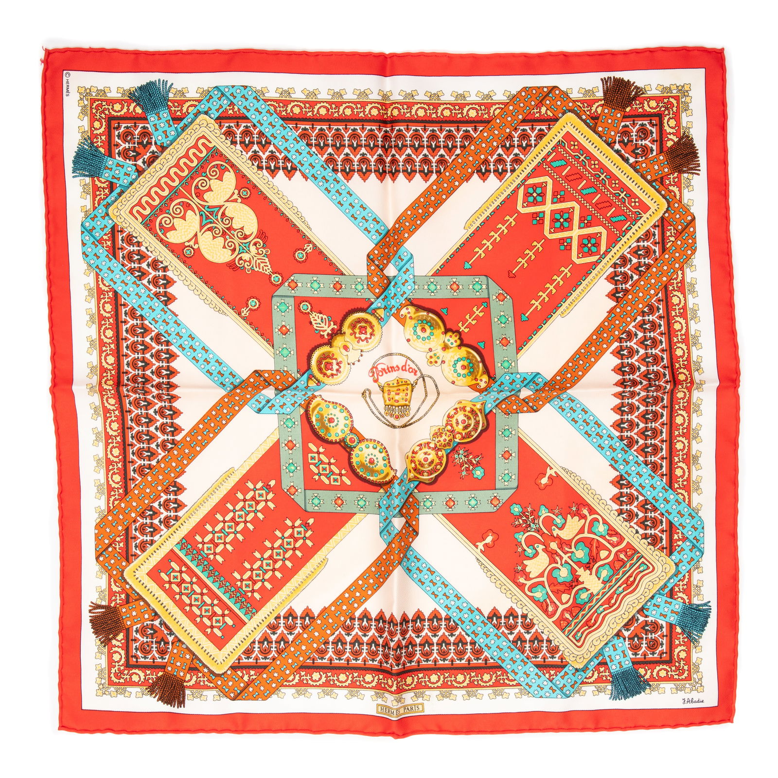 Hermes "Brins d'Or" Silk Scarf, by Julia Abadie, H.- 16 1/2 in., W.- 16 1/2 in.: Hermes "Brins d'Or" Silk Scarf, by Julia Abadie, orange/red background, featuring an x-form decorative design, signed, with hand rolled edges, accompanied with a certificate of authenticity, H.- 16 1/