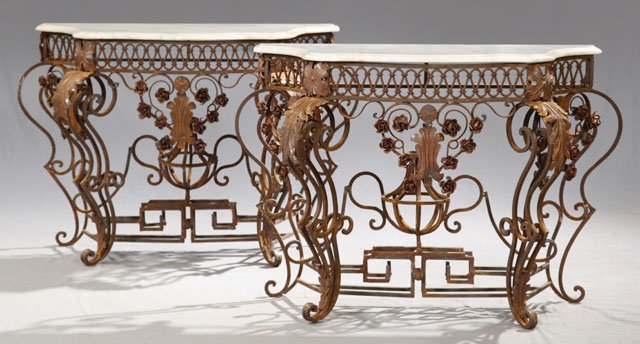 Pair of Wrought Iron Marble Top Console Tables, 20: Pair of Wrought Iron Marble Top Console Tables, 20th c., the ogee edge shaped white marble on floral and leaf decorated wrought iron bases, on scrolled legs, H.- 30 1/2 in., W.- 46 in., D.- 17 in.