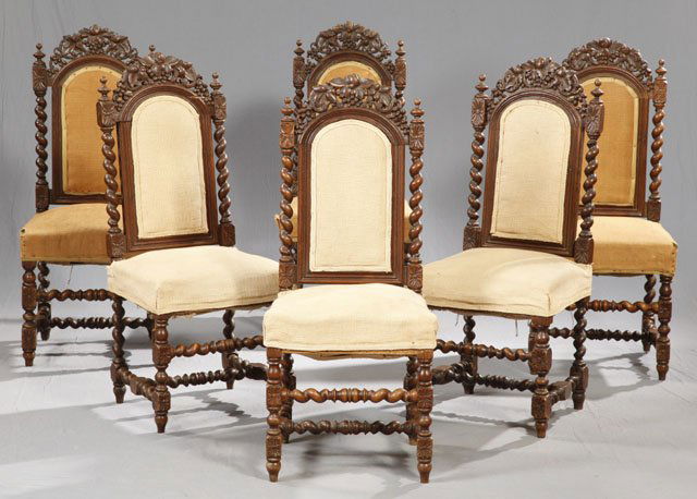 Set of Six Carved Oak Jacobean Style Upholstered D: Set of Six Carved Oak Jacobean Style Upholstered Dining Chairs, late 19th c., with pierced grape and leaf carved crests over burlap upholstered backs flanked by rope twist columns, to burlap upholster