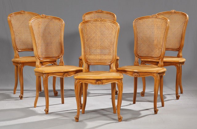 Set of Six Louis XV Style Carved Cherry Cane Back: Set of Six Louis XV Style Carved Cherry Cane Back and Seat Dining Chairs, with shell carved crests, on leaf carved cabriole legs to scrolled toes, en suite with previous lots, H.- 39 in.