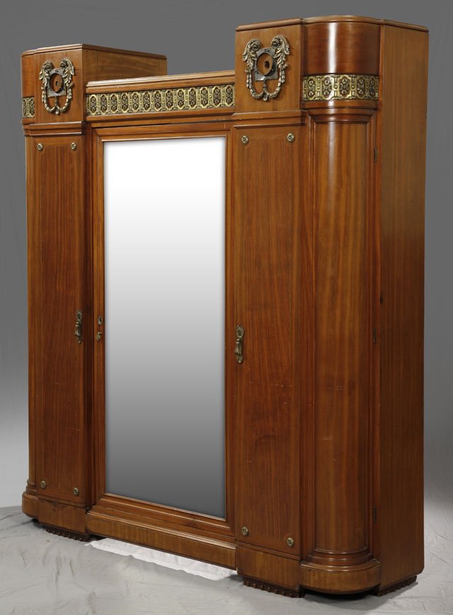 Unusual French Inlaid Ormolu Mounted Seven Piece: Unusual French Inlaid Ormolu Mounted Seven Piece Bedroom Suite, c. 1930, consisting of a marble top dresser, triple door armoire, pair of marble top nightstands, a vanity with a glass top, and a pair