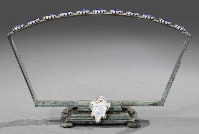 Unusual Patinated Bronze Walking Stick Display St: Unusual Patinated Bronze Walking Stick Display Stand, 20th c., the front with a porcelain plaque, "Walking Stick-Rack for Collection-Tiche," with apaces for 11 canes, H.- 15 1/2 in., W.- 24 1/2 in., D