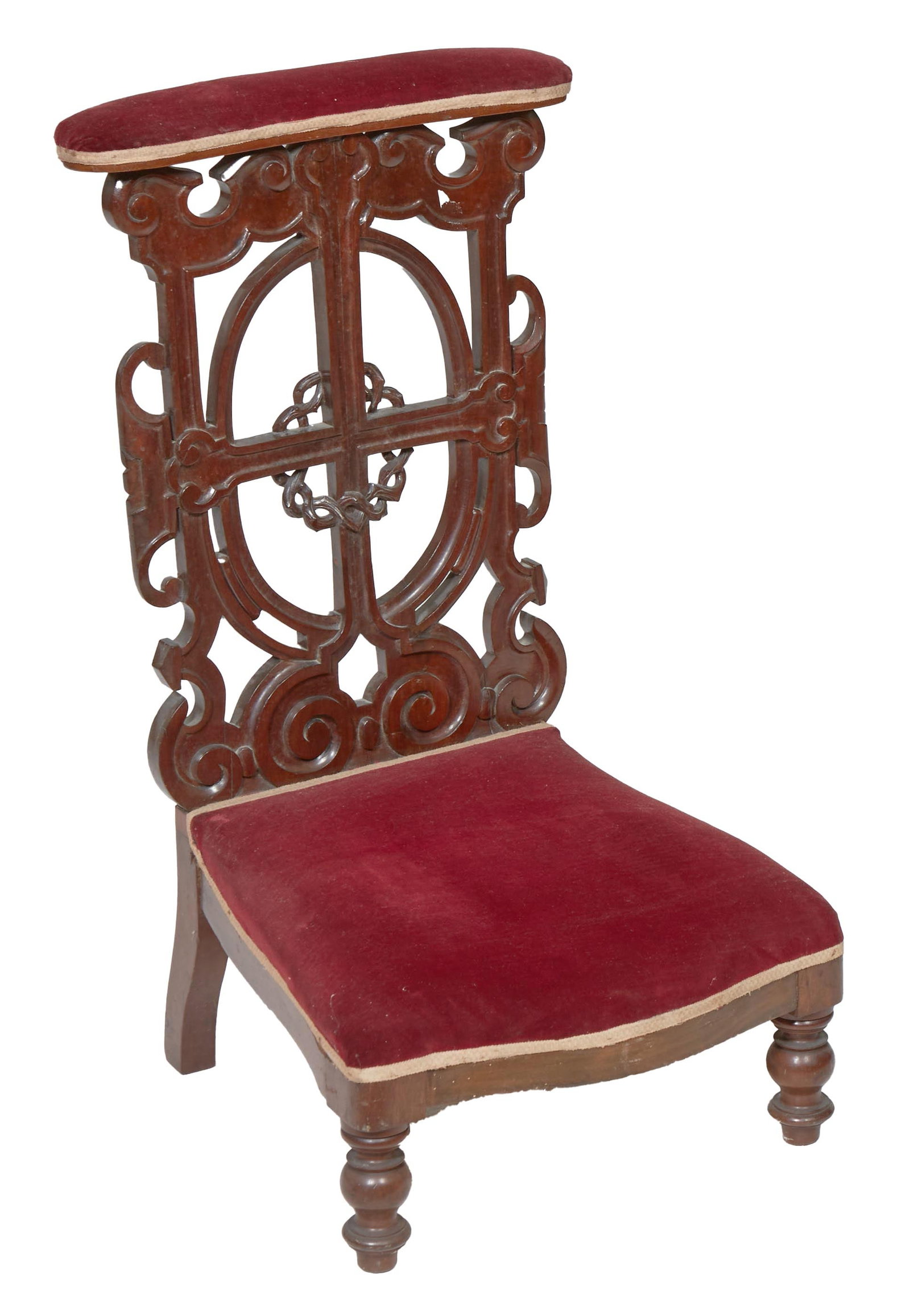 French Renaissance Revival Carved Walnut Pre Dieu, late 19th c., H.- 35 in., W.- 19 in., D.- 18 in.: French Renaissance Revival Carved Walnut Pre Dieu, late 19th c., velvet upholstered oblong arm rest, over a pierced scrolled back with crown of thorns, to the shaped kneeler, on vasiform feet, H.- 35 