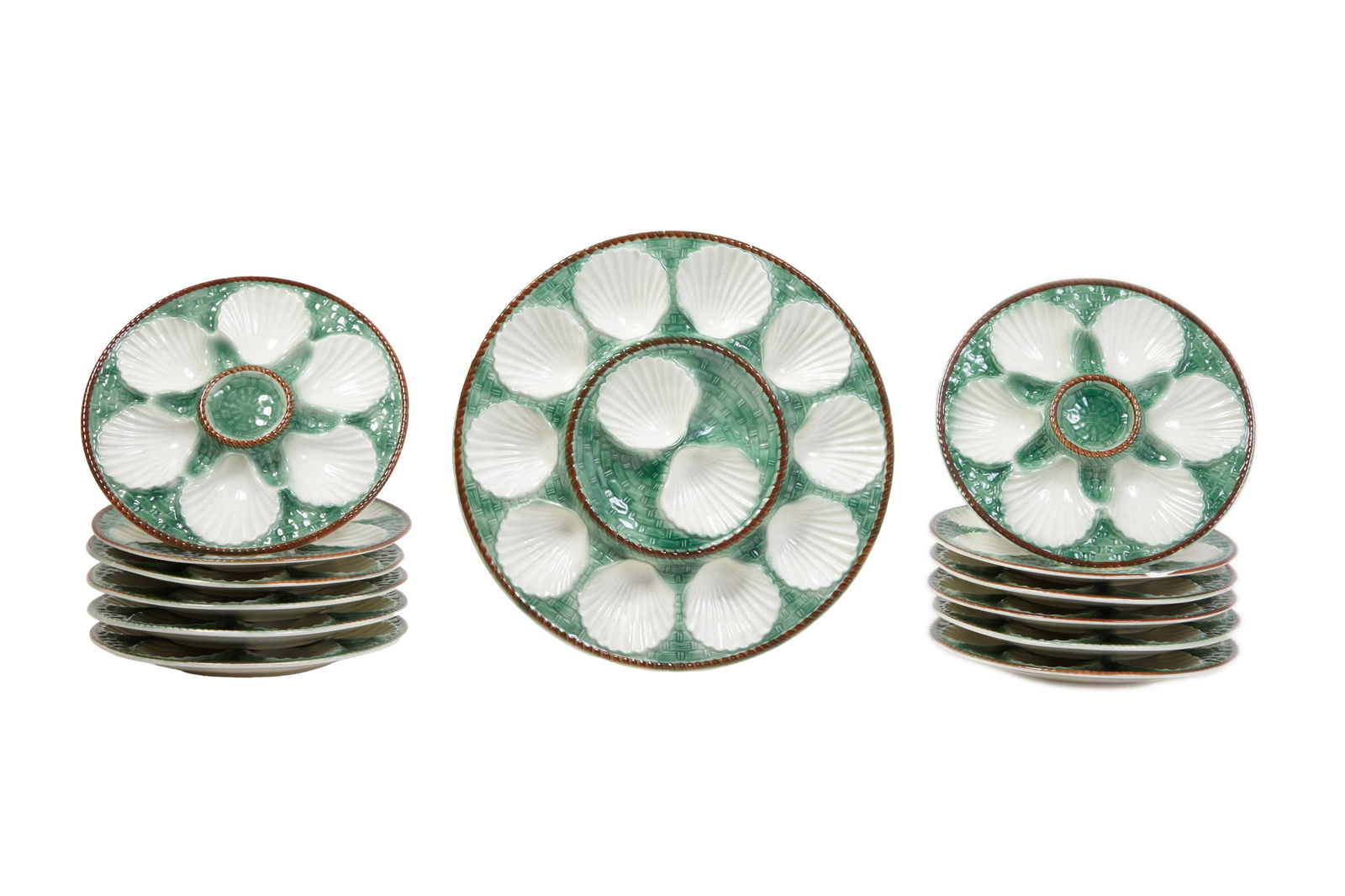 Thirteen Piece French Majolica Oyster Set, late 19th c., Plates- H.- 1 in., Dia.- 9 3/8 in., (1 of 3)