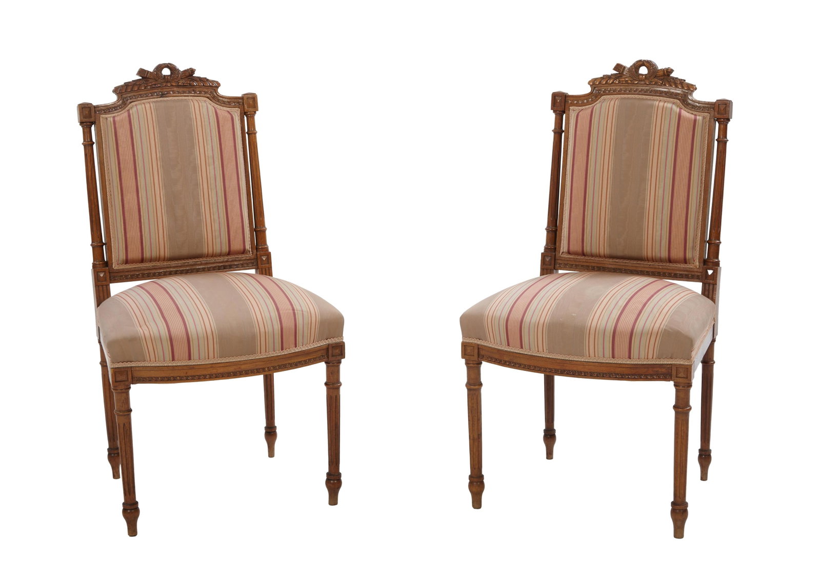 Pair of French Louis XVI Style Side Chairs, 20th c., H.- 37 1/2 in, W.- 20 5/8 in., D.- 20 in.: Pair of French Louis XVI Style Side Chairs, 20th c., pierced arched wreath trophy crest, on ring turned reverse tapered fluted columnar supports, to ring turned fluted tapered legs, on toupie feet, H.