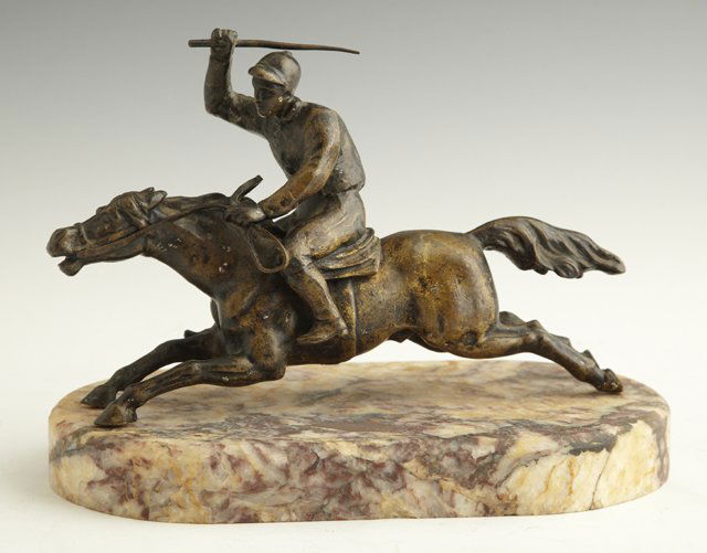 After Jean Leon Gerome (1824-1904), "Horse and Jocke: After Jean Leon Gerome (1824-1904), "Horse and Jockey in Full Gallop," 20th c., bronze, the name stamped on the back leg, now presented on an oval highly figured marble base, Figure- 6 in., W.- 8 1/2