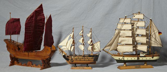Three Carved Wood Model Sailboats, 20th c., a Chin: Three Carved Wood Model Sailboats, 20th c., a Chinese junk with red sails; the "Gorch Fock," a German three master; and "HMS Victory," Junk- H.- 19 1/8 in., W.- 19 in., D.- 4 1/4 in.
