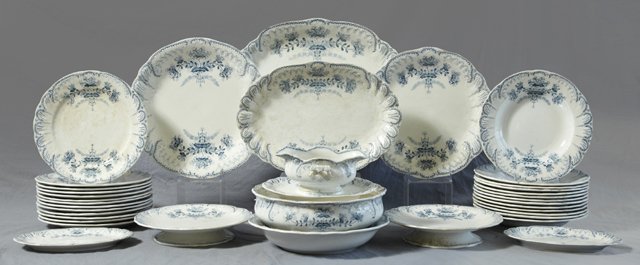 French Eighty-One Piece Partial Ironstone Dinner S: French Eighty-One Piece Partial Ironstone Dinner Service, 19th c., by St. Armand, in the "Regence" pattern, with blue floral decoration, consisting of 24 soup bowls, 24 dinner plates, 24 salad plates,