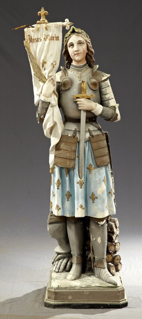 Large Plaster Statue of St. Joan of Arc, 19th c.,: Large Plaster Statue of St. Joan of Arc, 19th c., on a stepped octagonal wooden base, H.- 62 1/4 in., W.- 17 1/2 in., D.- 17 1/2 in.