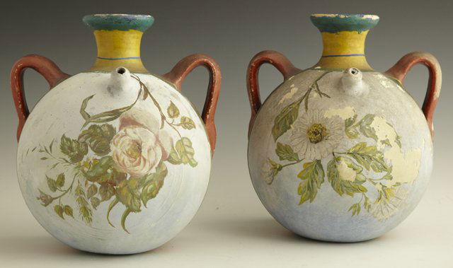 Pair of French Provincial Earthenware Gargoulettes: Pair of French Provincial Earthenware Gargoulettes, 19th c., with painted floral decoration, one side flat, H.- 10 1/2 in., W.- 8 3/4 in., D.- 7 1/4 in.
