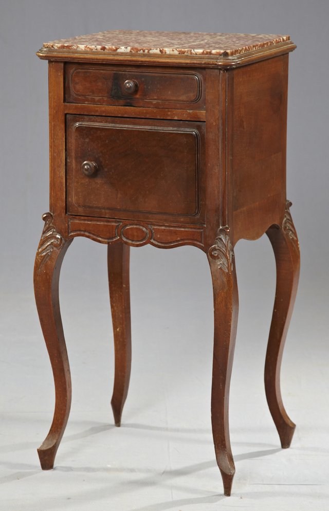 Louis XV Style Walnut Marble Top Night Stand, earl: Louis XV Style Walnut Marble Top Night Stand, early 20th c., the inset mottled rouge marble over a frieze drawer and a lower pot cupboard, on tapered leaf carved cabriole legs, H.- 32 3/4 in., W.- 16 