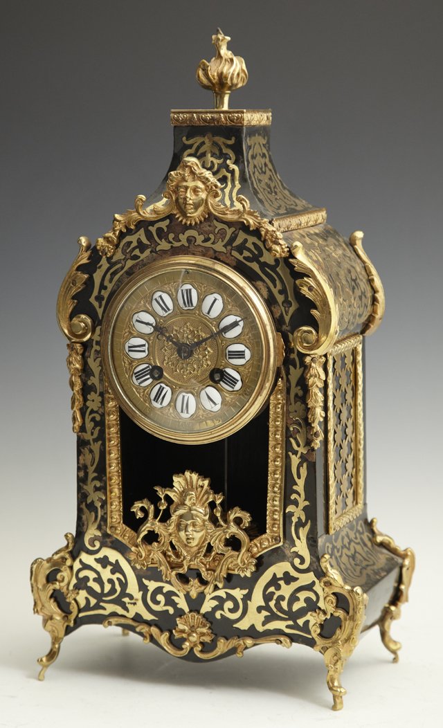 Ebonized Ormolu Mounted Boulle Bracket Clock, 19th: Ebonized Ormolu Mounted Boulle Bracket Clock, 19th c., by Japy Freres, the works also marked "Dufaud, Paris," with porcelain chapter marks, a flame finial surmount, and a sunburst pendulum, the glass