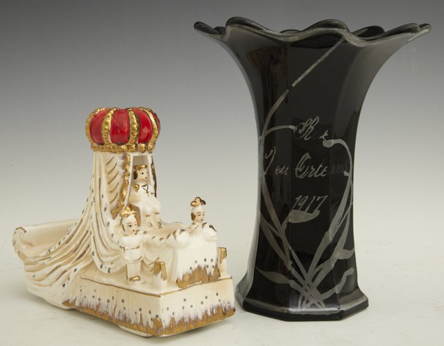 Two Rex Mardi Gras Items, consisting of a Krewe fa: Two Rex Mardi Gras Items, consisting of a Krewe favor, 1917, in the form of a silver deposee black glass vase, and a Ceramic King's float, c. 1950, marked Philip Walmsley, in original box. (2 items)