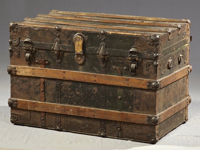 Camel Oak and Iron Flat Top Slatted Trunk, early 2: Camel Oak and Iron Flat Top Slatted Trunk, early 20th c., H.- 21 3/4 in., W.- 32 1/2 in., D.- 19 in.