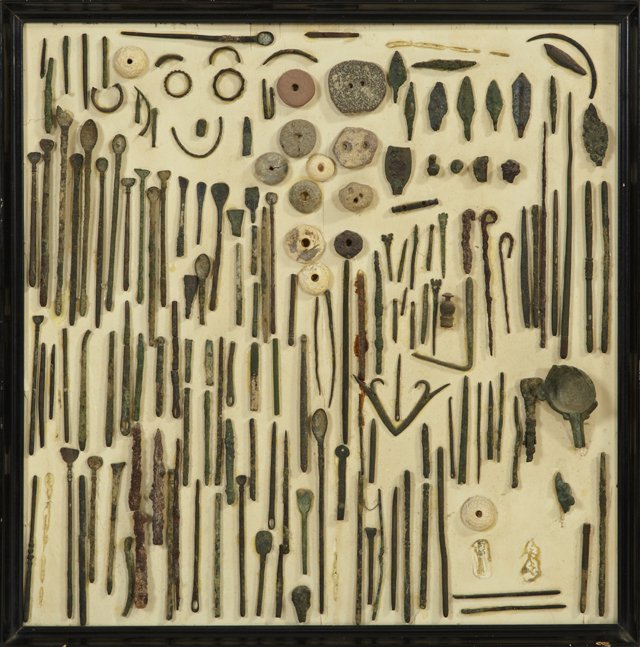 Group of Ancient Metal Fragments, most bronze, fro: Group of Ancient Metal Artifacts, most bronze, from digs in Yemen, including spear points, needles, spoons, etc, presented as a collage in a shadowbox frame, together with a group of 33 loose examples