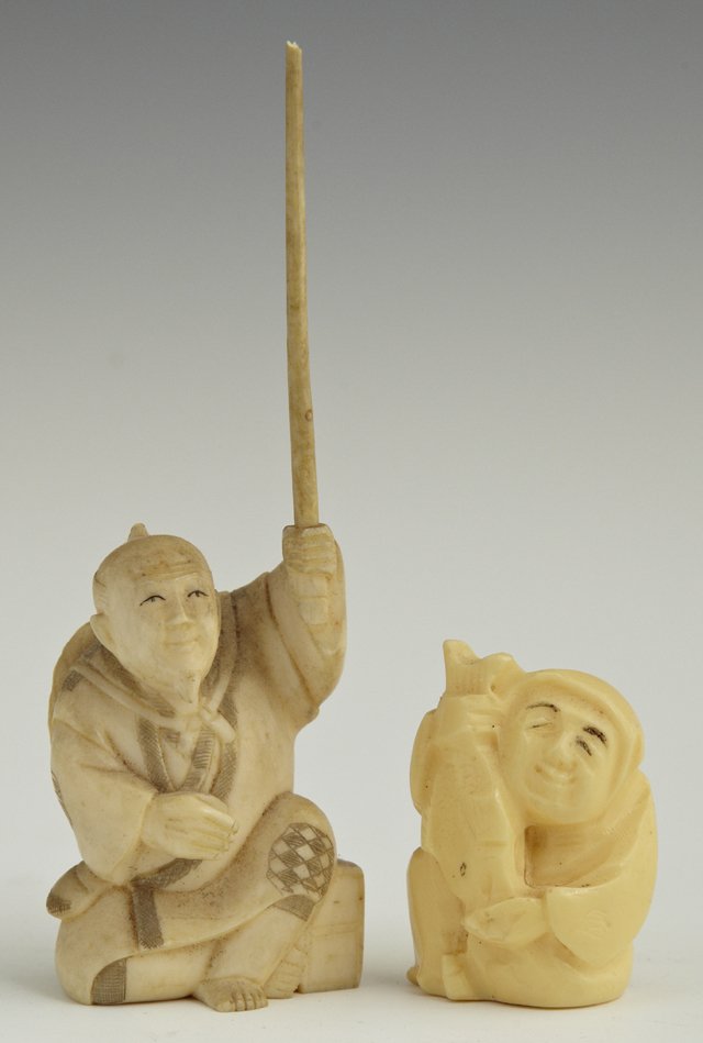 Two Pieces of Carved Ivory, early 20th c., a nets: Two Pieces of Carved Ivory, early 20th c., a netsuke of a man holding a fish, and a figure of a warrior with a staff, with scrimshaw decoration, Warrior- H.- 4 1/8 in., W.- 1 3/8 in., D.- 1 1/8 in.