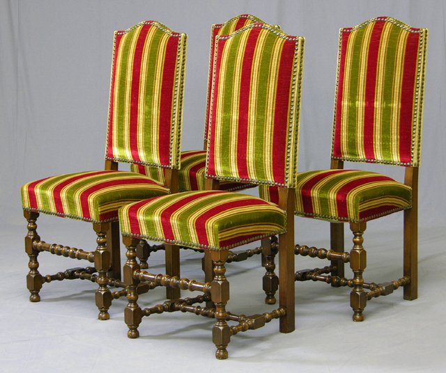 Set of Four Carved Birch Louis XIII Style Dining: Set of Four Carved Birch Louis XIII Style Dining Chairs, 20th c., with arched high backs, with brass tack upholstery, the whole on turned and block legs joined by turned stretchers, in red, white, gre