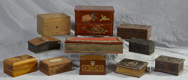 Group of Eleven Boxes, 20th c., consisting of 3 o: Group of Eleven Boxes, 20th c., consisting of 3 oriental, 2 of papier mache; one hammered copper; 3 of inlaid wood; 2 French provincial; one Indian of Shesham wood; and one of treasure chest form. (11