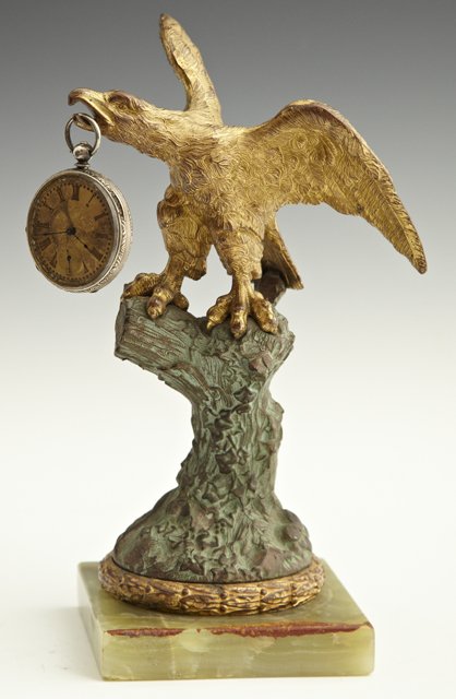 Unusual Patinated and Gilt Bronze Eagle Pocket: Unusual Patinated and Gilt Bronze Eagle Pocket Watch Holder, 19th c., on a green onyx base, together with a 19th c. silver plated pocket watch , key wind, key set, H.- 8 3/4 in., W.- 4 1/2 in., D.- 4 