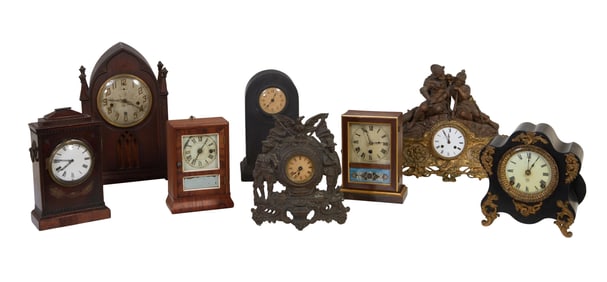 Group of Eight Mantel Clocks, early 20th c. New Haven- H.- 16 in., W.- 10 in., D.- 6 1/2 in.; Battle