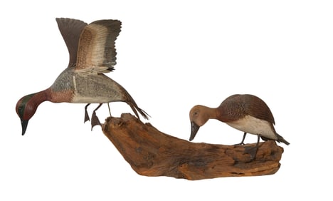 Two Carved Wooden Duck Decoys, 20th c., H.- 16 in., W.- 27 in., D.- 12 in.
