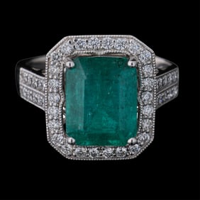 Lady's Platinum Emerald and Diamond Dinner Ring, by Oscar Friedman, Total Diamond Wt.- 0.50 carats,