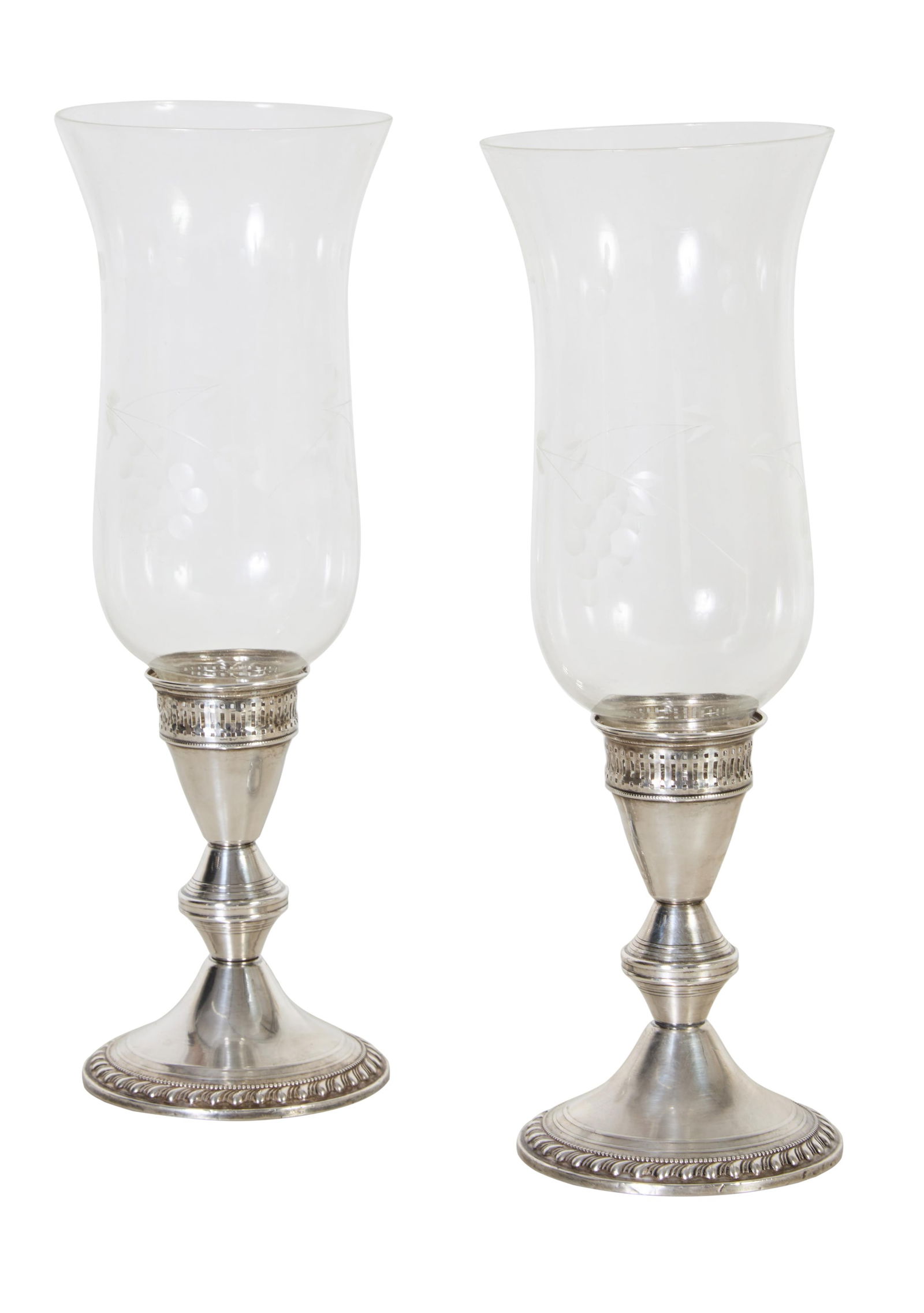 Pair of Weighted Sterling Low Candlesticks, 20th c., Candlestick- H.- 4 1/2 in., Dia.- 3/1/2 in.,: Pair of Weighted Sterling Low Candlesticks, 20th c., by Poole, #H200, with etched hurricane glass shades, Candlestick- H.- 4 1/2 in., Dia.- 3/1/2 in., With Shade- H.- 11 1/2 in. (2 Pcs.)