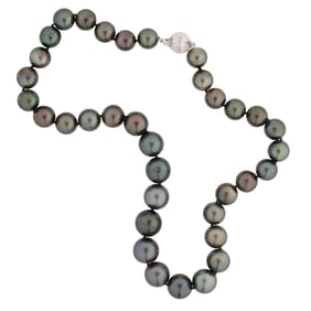 Strand of Thirty-Five Graduated Dark Grey Tahitian Cultured Pearls, L.- 18.5 in., with appraisal.