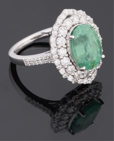 Lady's Platinum Paraiba Tourmaline and Diamond Dinner Ring, by Sheffield & Sons, London, Total