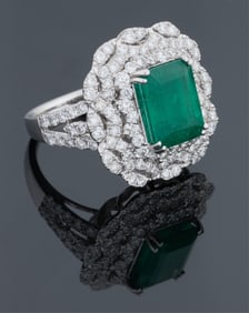 Lady's Platinum Emerald and Diamond Dinner Ring, by Sheffield & Sons, London, Total Diamond Wt.-