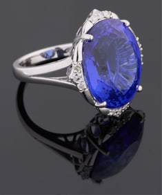 Lady's Platinum Sapphire and Diamond Dinner Ring, by Oscar Friedman, Total Diamond Wt.- 0.28 carats,