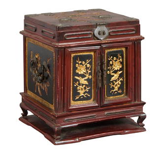 Chinese Carved Hardwood Jewelry Box, 20th c., H.- 10 1/2 in., W.- 9 3/8 in., D.- 9 1/4 in.: Chinese Carved Hardwood Jewelry Box, 20th c., the gilt incised lid lifting to a fold out mirror in a pierced giltwood figural frame, over double doors opening to two drawers, on cabriole legs to a fla