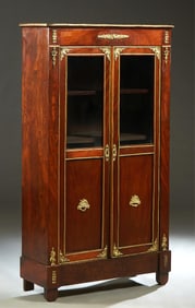French Louis XVI Style Ormolu Mounted Walnut Bookcase, early 20th c., H.- 64 in., W.- 36 in., D.- 12