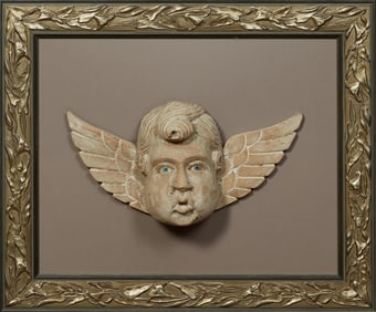 Carved Wood Cherub Head, 19th c., H.- 8 in., W.- 15 1/2 in., D.- 3 1/2 in.