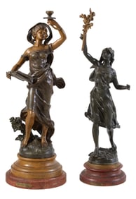 Two Patinated Spelter Female Statues, early 20th c., Book- H.- 22 1/2 in., Dia.- 8 1/2 in.; Branch-